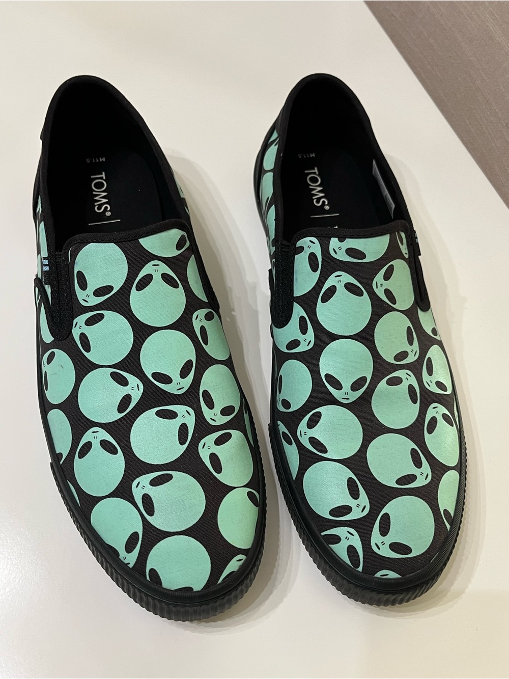 TOMS Men's 11.5 Alien Glow In The Dark Slip On Shoes Black Mint Green
